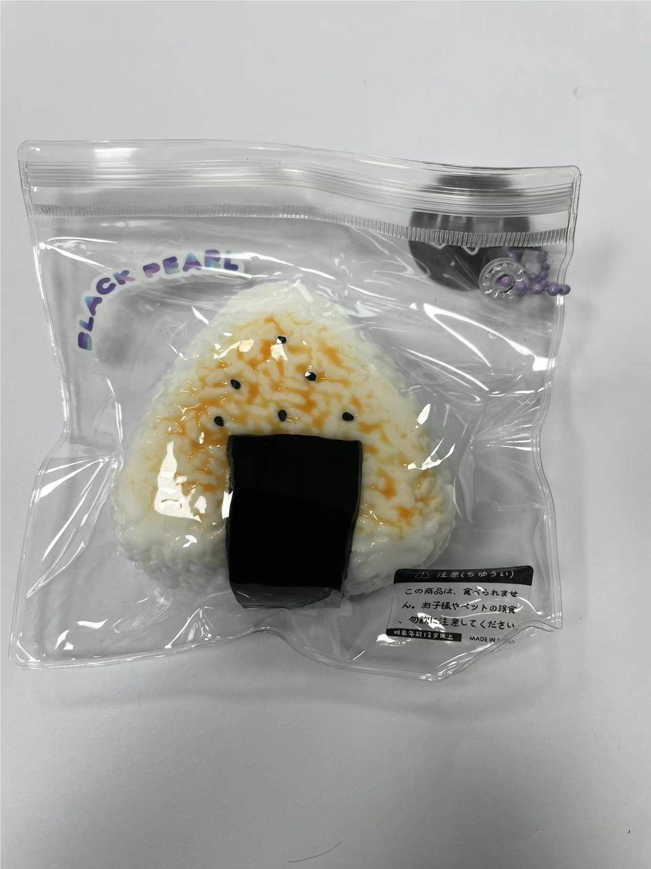 Игрушка-антистресс Рисовый треугольник
