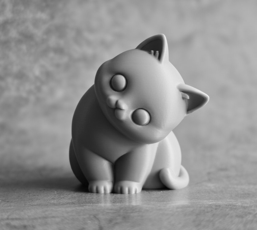 Игрушка "Котенок с наклоненной головой"