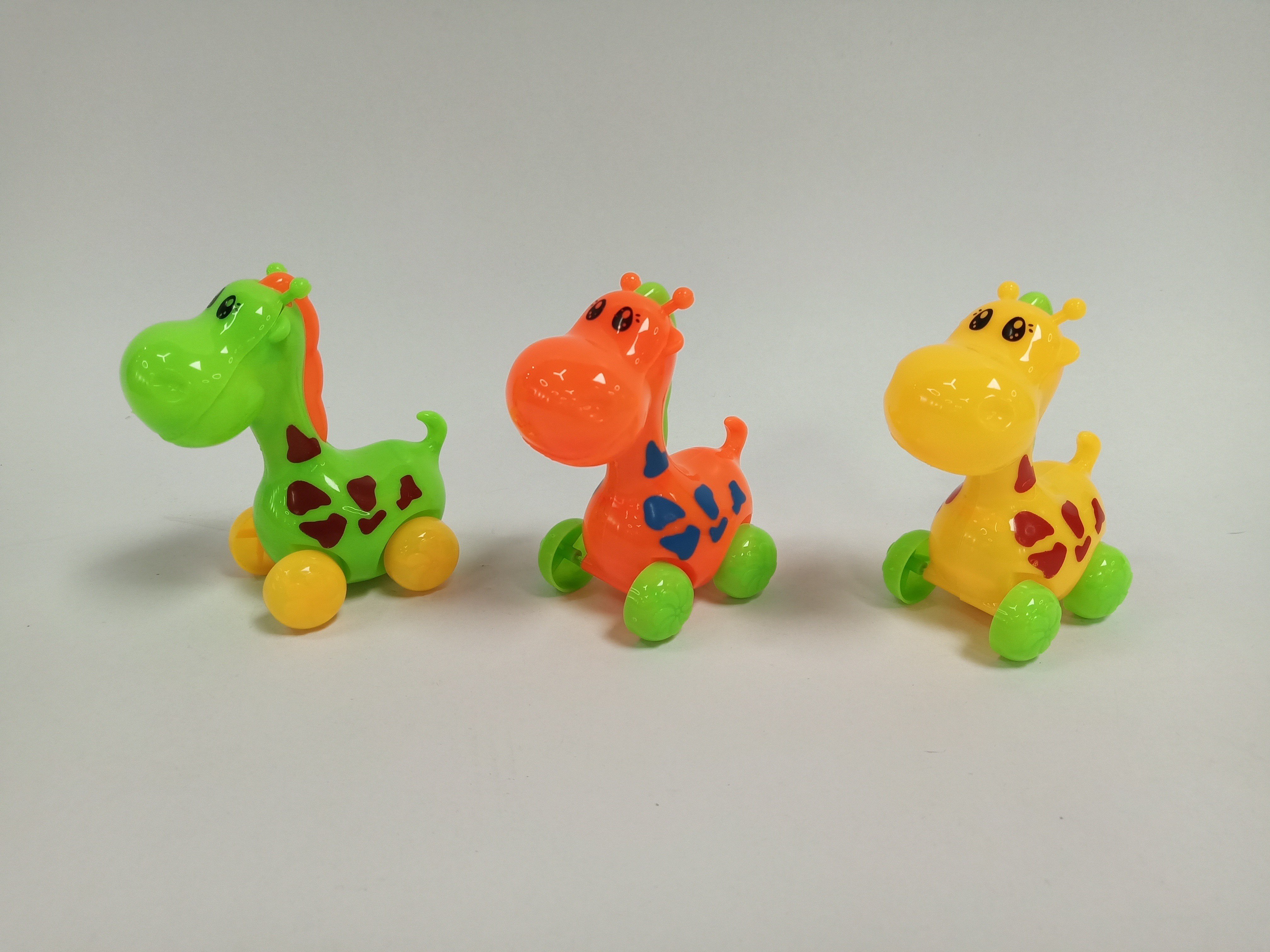 Игрушка-каталка Жираф Huili, 3 цвета в миксе, оптом